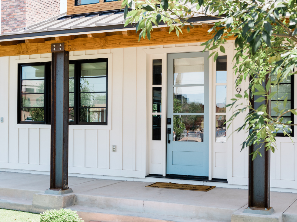 A Beautiful White House With Light Blue Door - Asian Paints