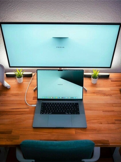 Sleek Looking Monitor and Laptop on Wooden Table - Beautiful Homes Sleek Looking Monitor and Laptop on Wooden Table - Beautiful Homes