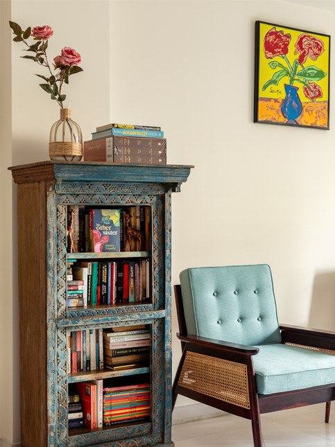 The blue bookshelf in her living room, picked up at an antique store in Delhi – Beautiful Homes The blue bookshelf in her living room, picked up at an antique store in Delhi – Beautiful Homes
