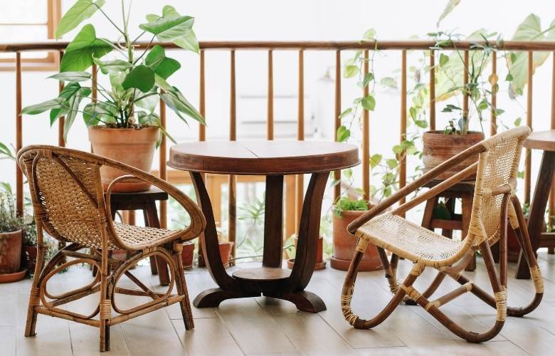 Balcony garden décor ideas with wooden table & chair - Beautiful Homes Balcony garden décor ideas with wooden table & chair - Beautiful Homes