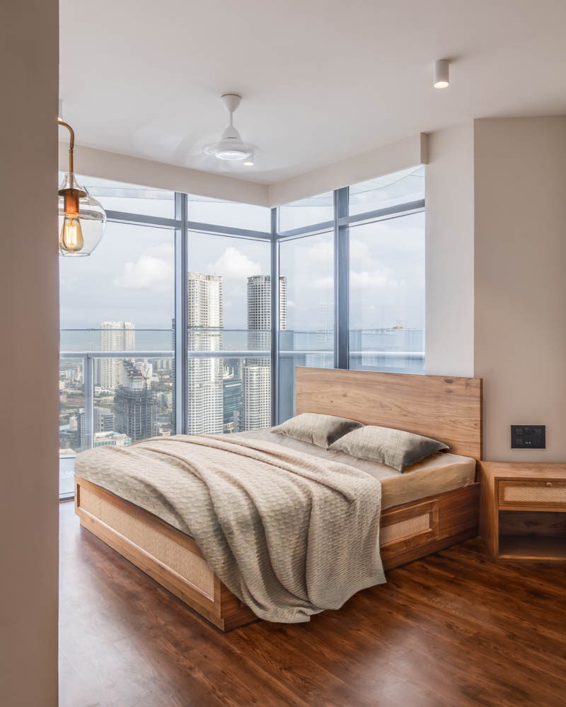 A bedroom with large windows A bedroom with large windows