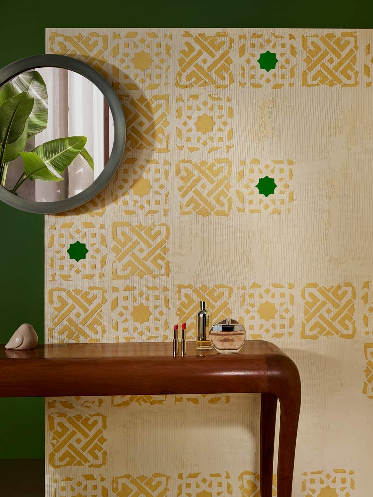 A cream coloured wall with a table placed in front of it