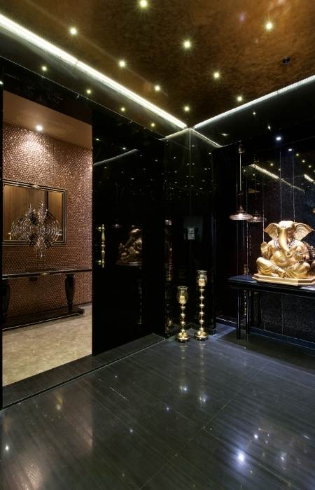 Pooja room door design with dark lacquered glass - Beautiful Homes Pooja room door design with dark lacquered glass - Beautiful Homes