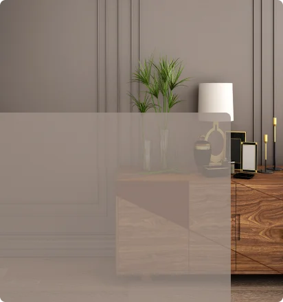 A wooden console table decorated with table lamp and vase beneath a grey wall. Asian Paints Essential wood coating range.