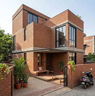 Modern Box House with Exposed Brick Finish