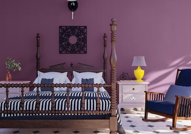 Rustic-Bedroom-with-Deep-Purple-Wall-m