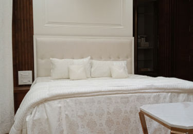 Minimal Bedroom with Wooden Accents