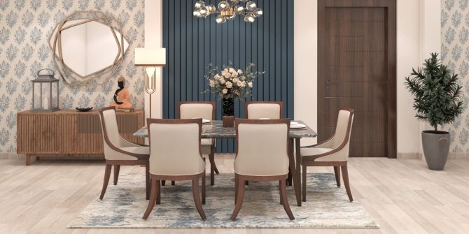 Dining area with a 6-seater round wooden dining table with grey upholstered chairs. Beautiful Homes Services for dining rooms.