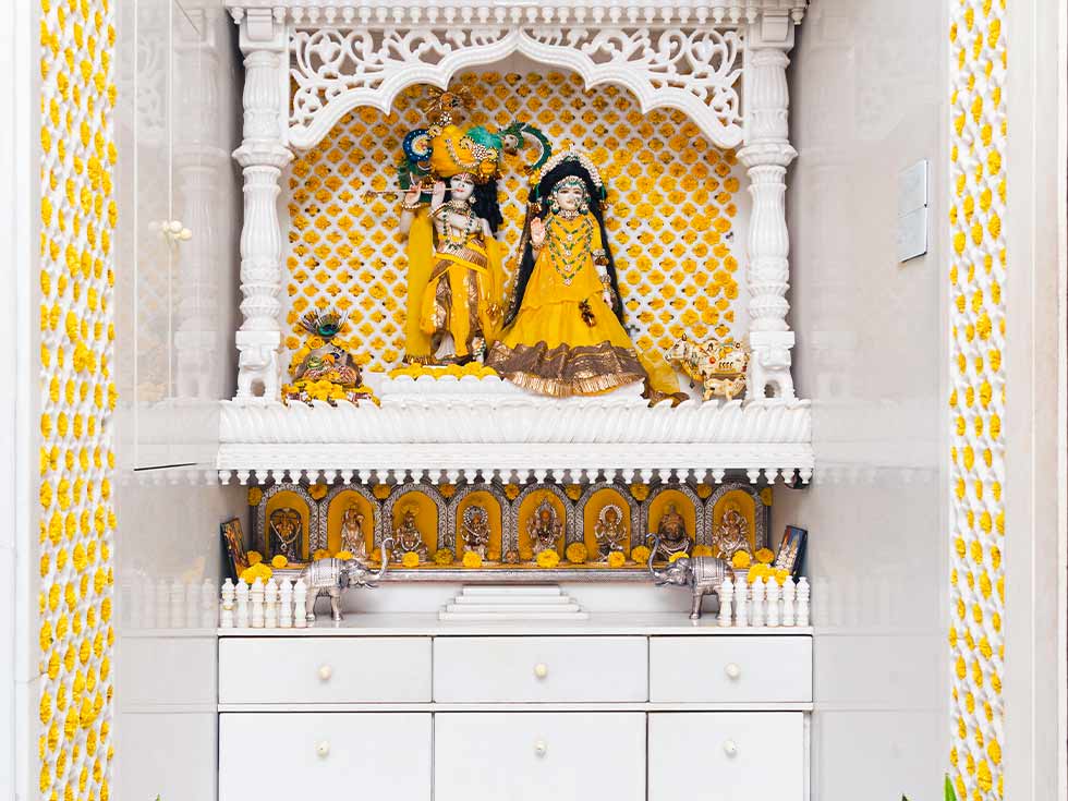 White marble pooja unit design for your pooja room interior - Beautiful Homes