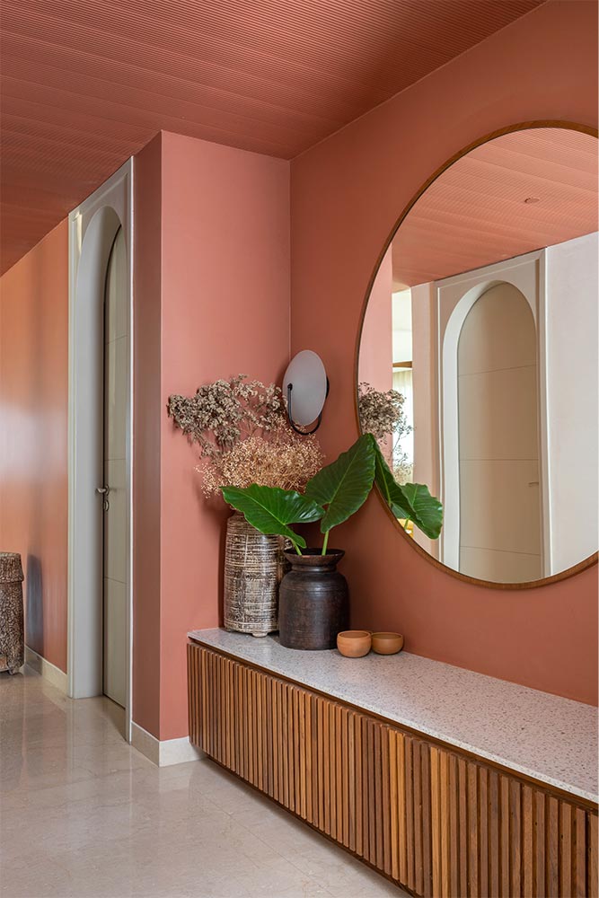 Foyer hallway design with mirror décor - Beautiful Homes