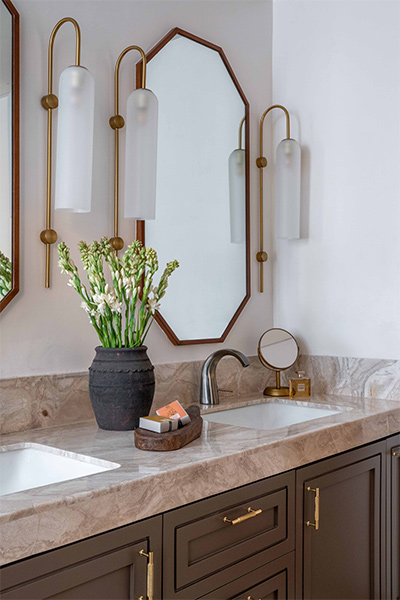 Master bathroom with mirror & wall lamp - Beautiful Homes