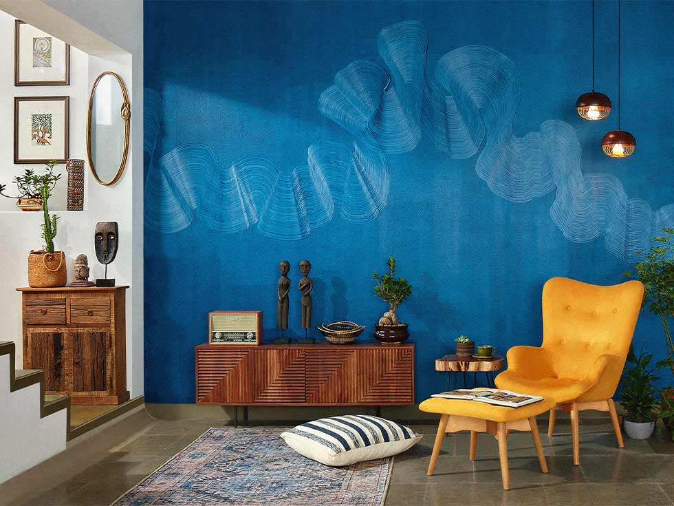 Blue textured accent wall designs with a yellow sofa chair - Beautiful Homes