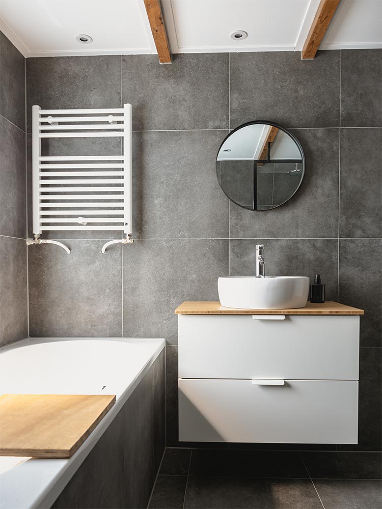 Wash basin vanity with vitrified tile backsplash - Beautiful Homes