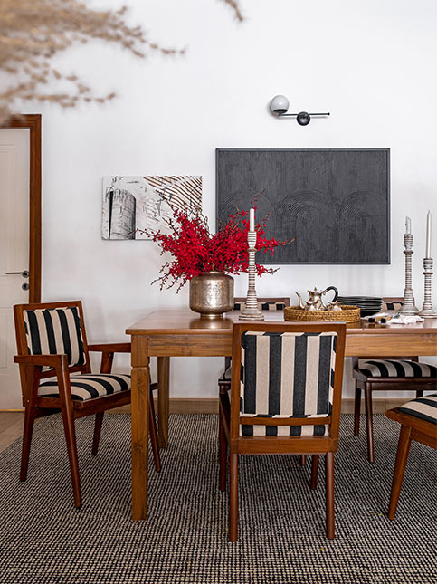 Dining room décor with black & white wooden chairs - Beautiful Homes