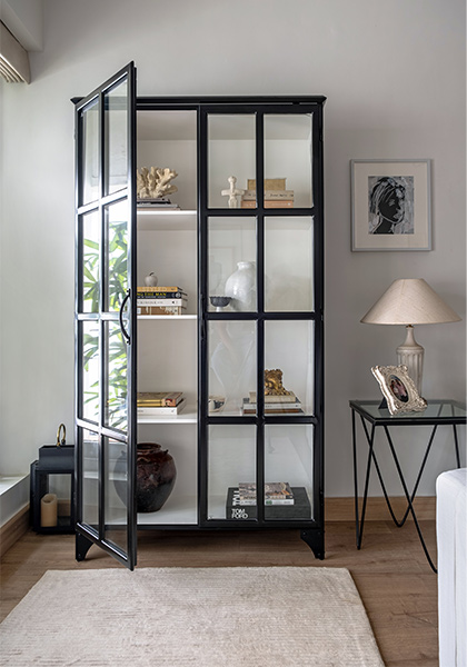 Glass display cabinet with black rim - Beautiful Homes