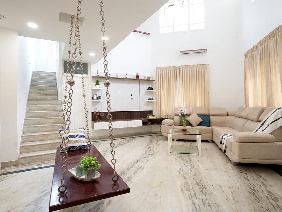 Double heighted living room with neutral colours for walls & furnishings - Beautiful Homes