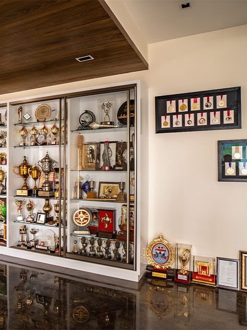 A room adorned with Sindhu’s trophies, medals, and a whimsical collection of stuffed-toy mascots from international championships