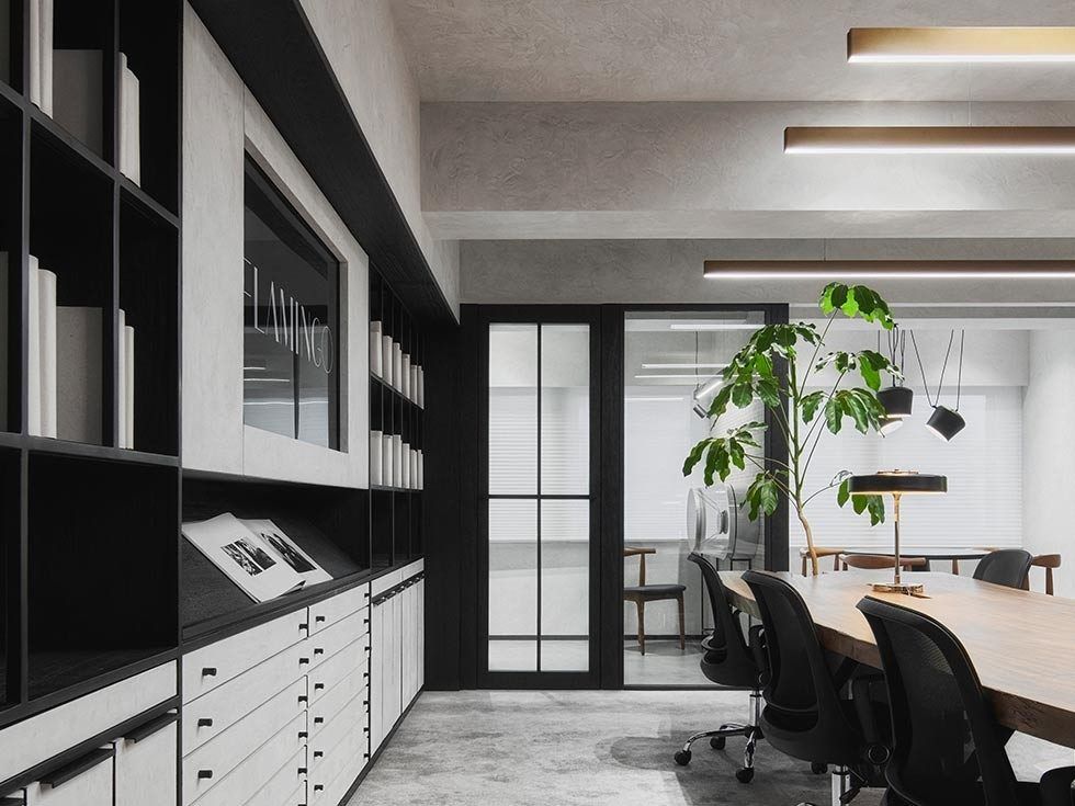 Open office area with a workstation & calm lighting - Beautiful Homes