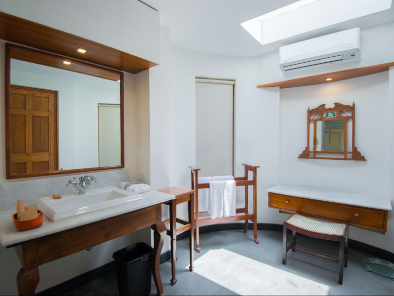 Sleek designer mirror for wash basin - Beautiful Homes