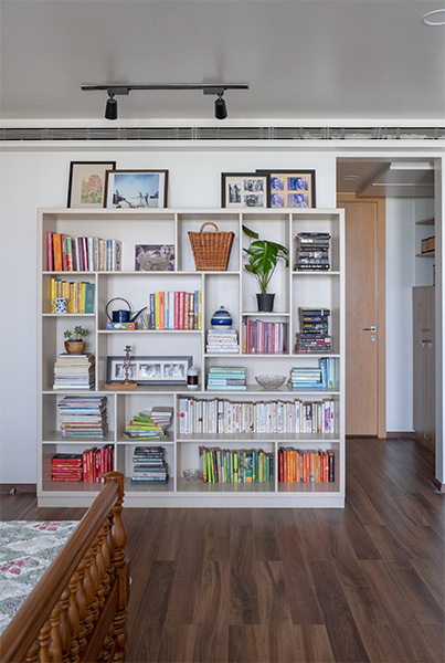 Custom bookshelf in master bedroom