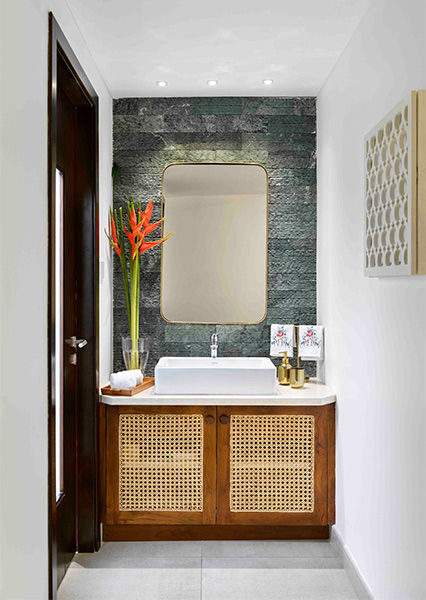 Powder room with green marble walls - Beautiful Homes