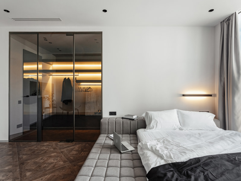 Glass wardrobe design for your modern bedroom - Beautiful Homes