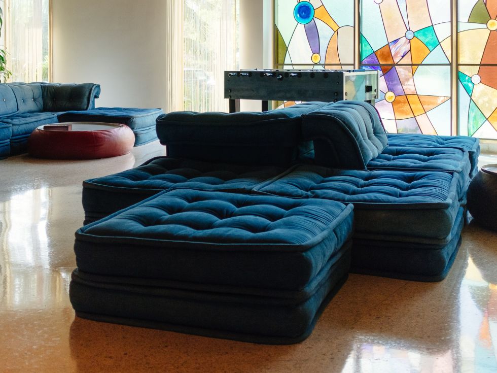 Blue Sofa-cum-bed for a space saving design - Beautiful Homes
