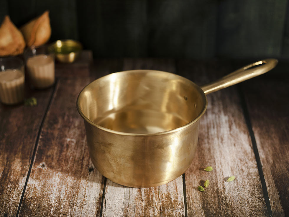 Bronze Small Pot Cookware For Your Kitchen Interiors – Beautiful Homes