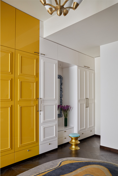 Yellow & white cupboard design with attached dressing table – Beautiful Homes