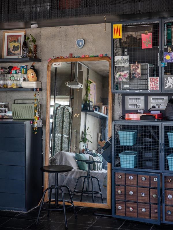 Full-size wall mirror with a black stool – Beautiful Homes