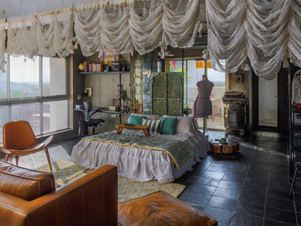 Studio apartment design with yellow sofa & low bed – Beautiful Homes