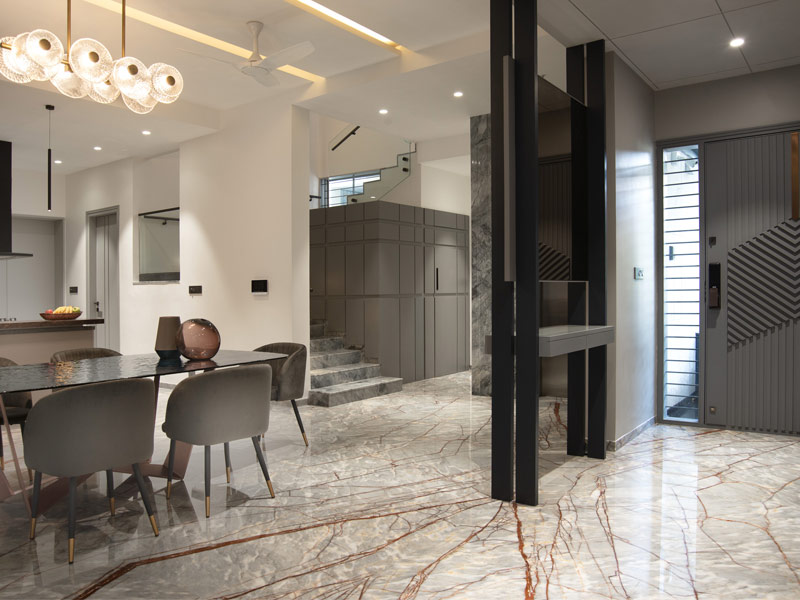 Living dining partition with marble floors - Beautiful Homes