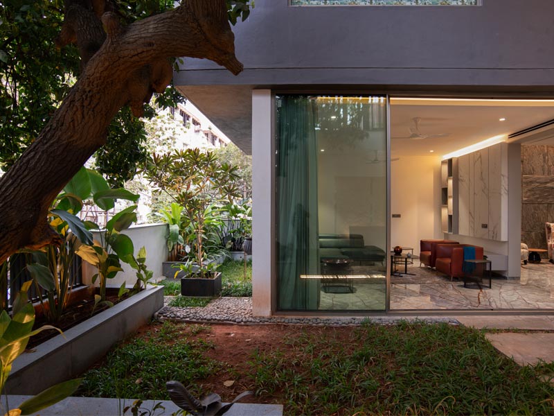 L-shaped balcony design with the mango tree - Beautiful Homes