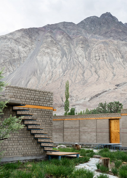 Exterior staircase design with exposed brick walls - Beautiful Homes