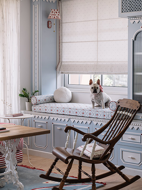 Whimsical Blue Seating By Window - Beautiful Homes