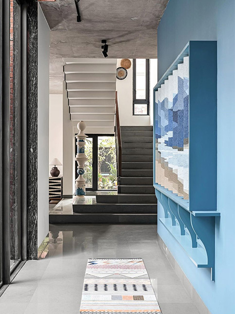 Beautiful Hallway With Blue Wall And Stairs - Beautiful Homes