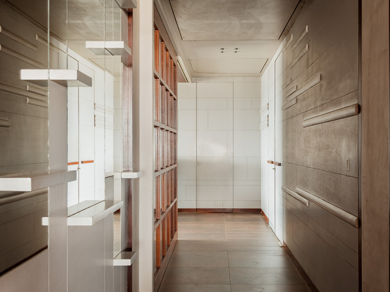 Hallway with cement wall design - Beautiful Homes