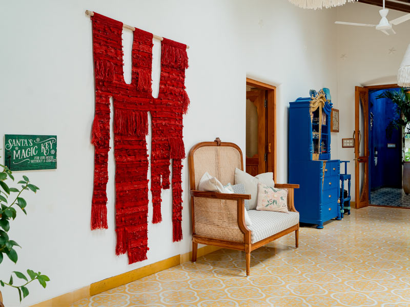 Striking indigo-blue cabinet accented with gold paint – Beautiful Homes