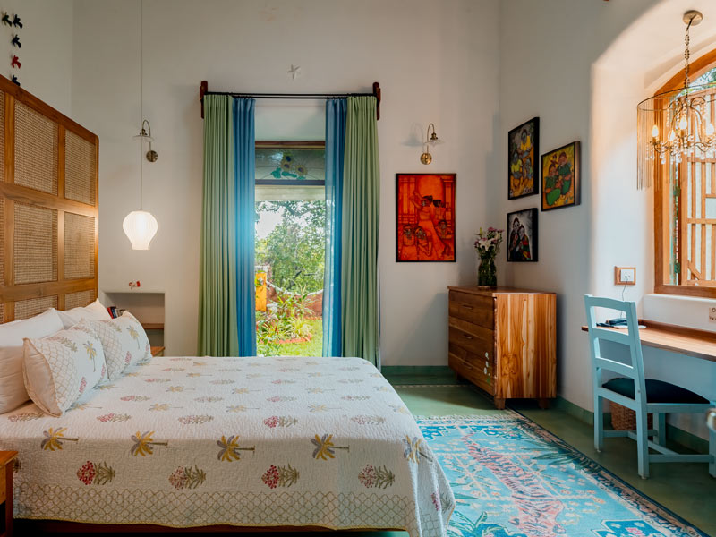 Rattan bed headboard and simple cotton fabrics – Beautiful Homes