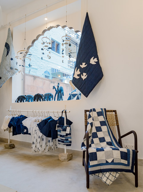 Nila Studio Collection of Textiles in White and Dark Blue - Beautiful Homes
