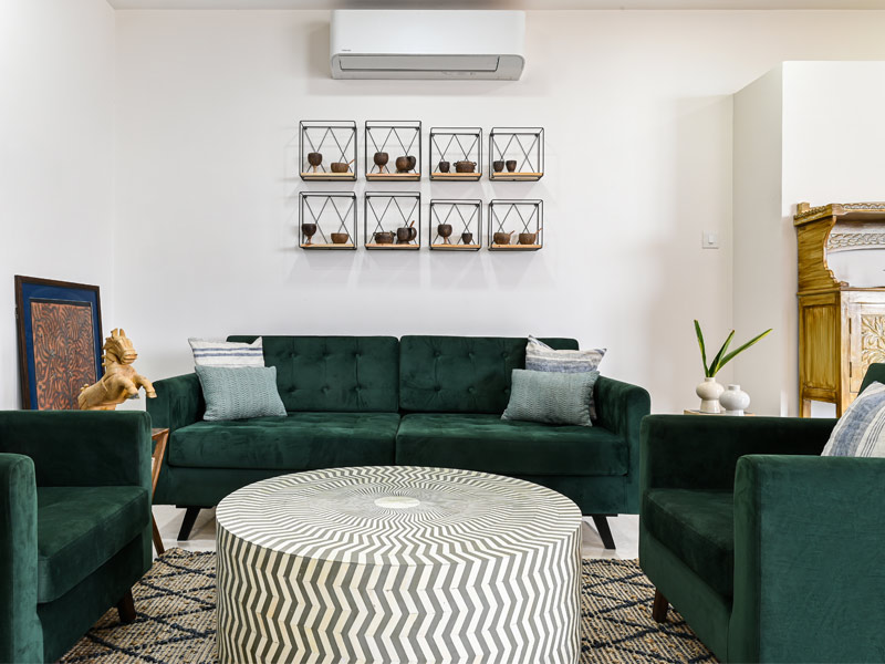 Emerald green sofa for a sitting area - Beautiful Homes