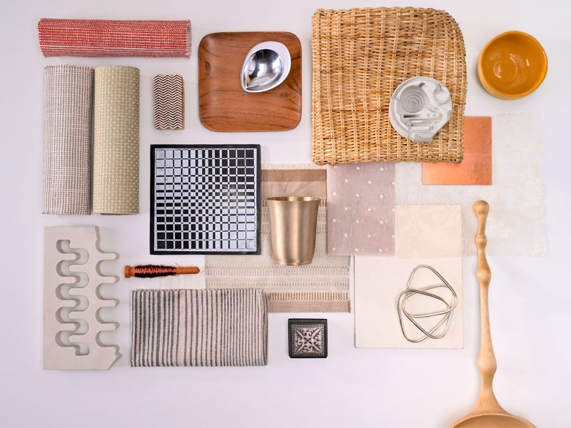 Top view of assorted home décor items including textiles, ceramics, and woven pieces arranged aesthetically – Beautiful Homes