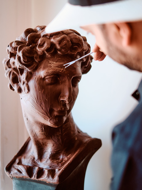 Chocolate coating on a David sculpture - Beautiful Homes