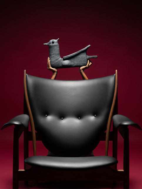 Artsy Black Statement Chair with Brown Details - Beautiful Homes