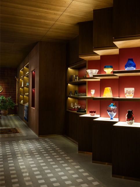 Room Filled with Display Shelves and Grey Floor - Beautiful Homes