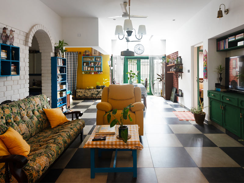Long living room with checquered floors - Beautiful Homes