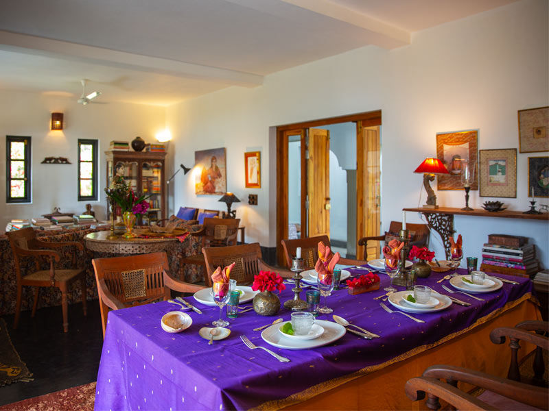 The Ground-Floor Dining & Living Room with Library at Isla’s Ridge - Beautiful Homes