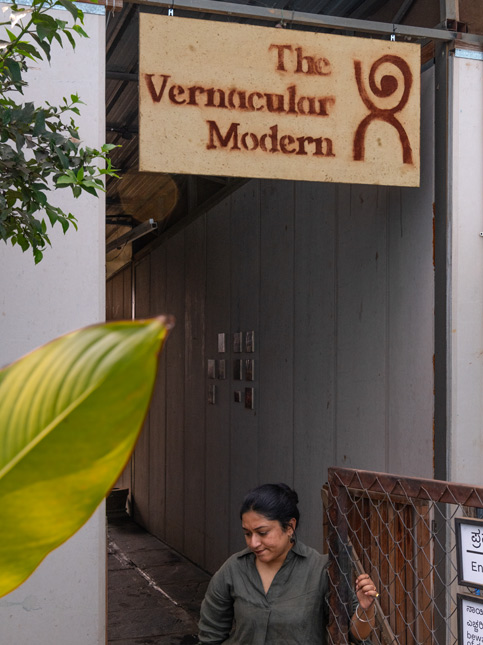 The Vernacular Modern Board at Entrance - Beautiful Homes