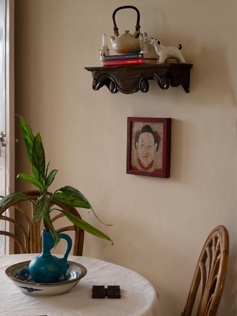 Simple Round Table with Antique Crockery - Beautiful Homes
