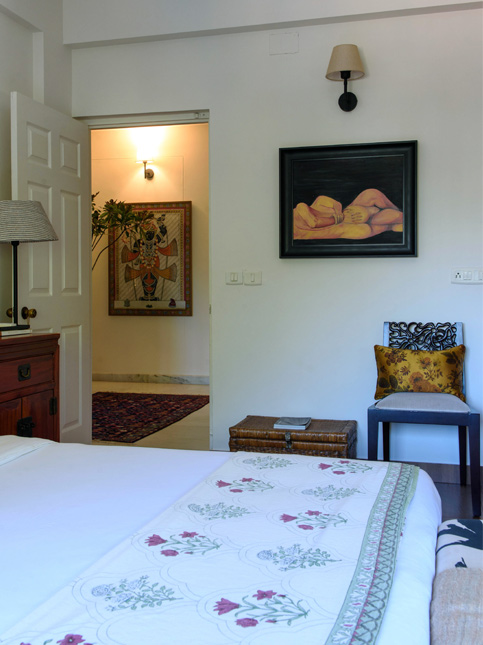 Art-filled cozy bedroom corner – Beautiful Homes